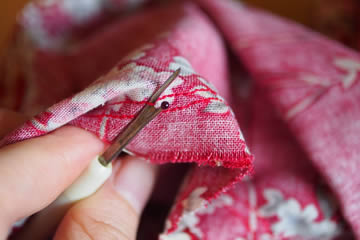 Cómo coser una funda de almohada a mano